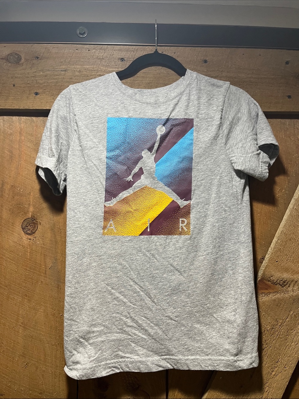 Jordan Gray Short Sleeve Tee with Blue, Yellow & Maroon Jumpman Graphic